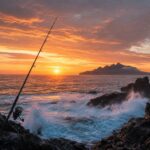 夜明けの沖磯、荒々しい岩礁と朝焼けの海